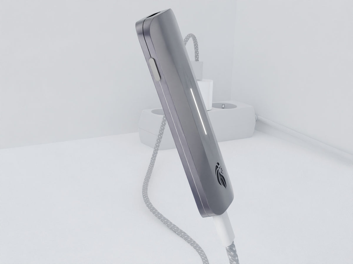 Leo connected to a charger with its LED bar lit